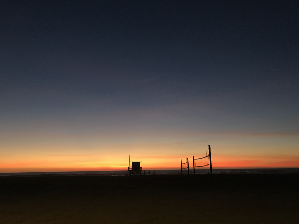 beach volleyball at sunset